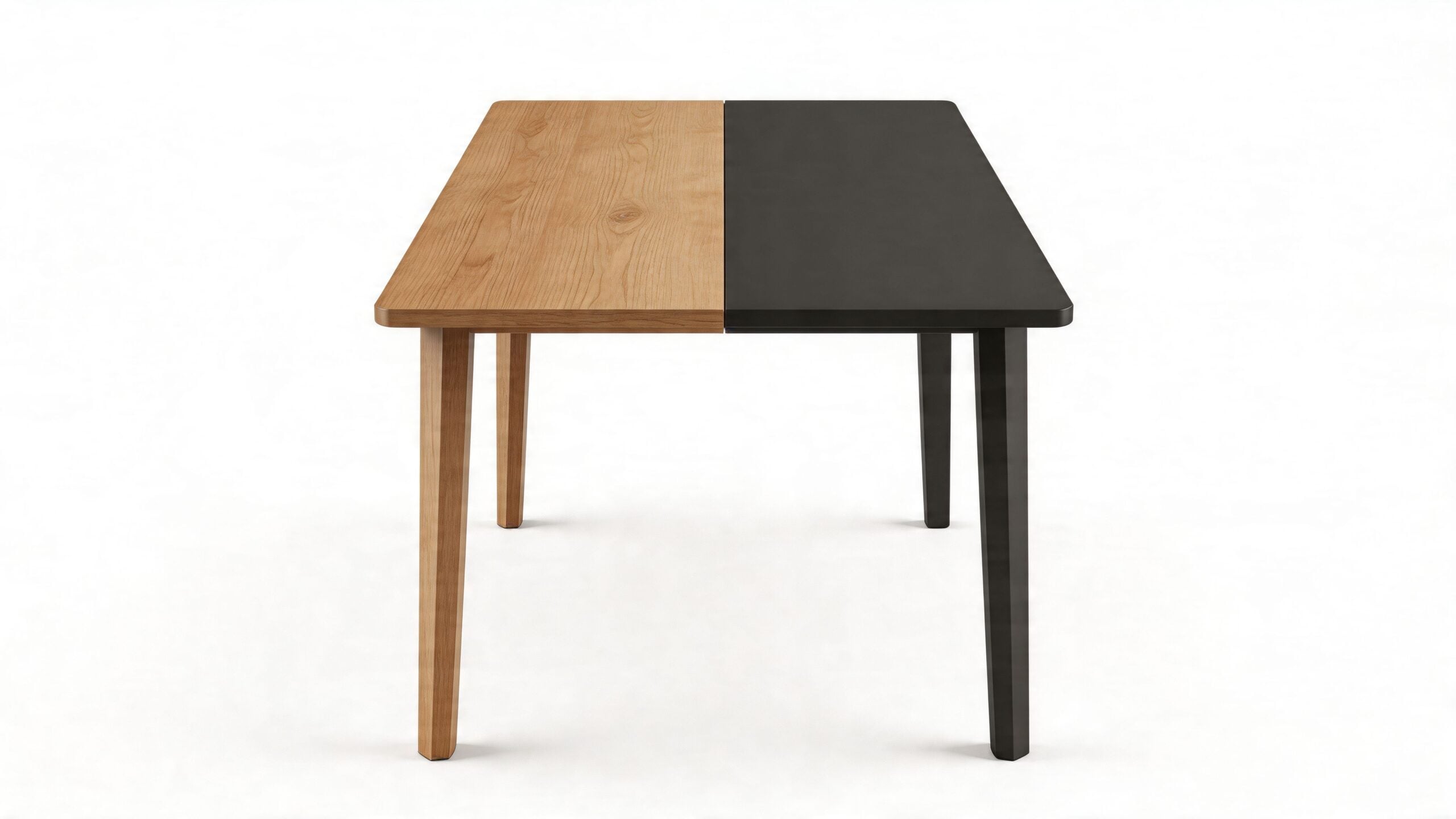 A modern minimalist dining table with a split design featuring one half oak wood and one half black.