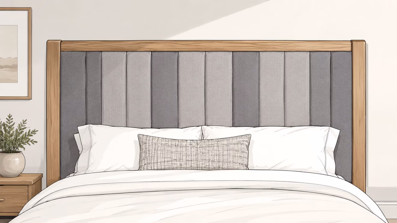 A modern bed with a two-toned grey upholstered vertical panel headboard and natural wood frame.